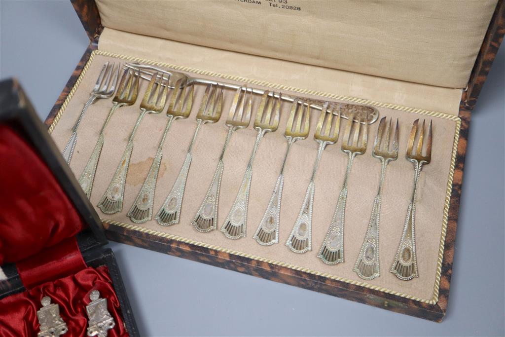 A cased set of silver teaspoons, a set of continental white metal cake forks and sundry mainly silver flatware.